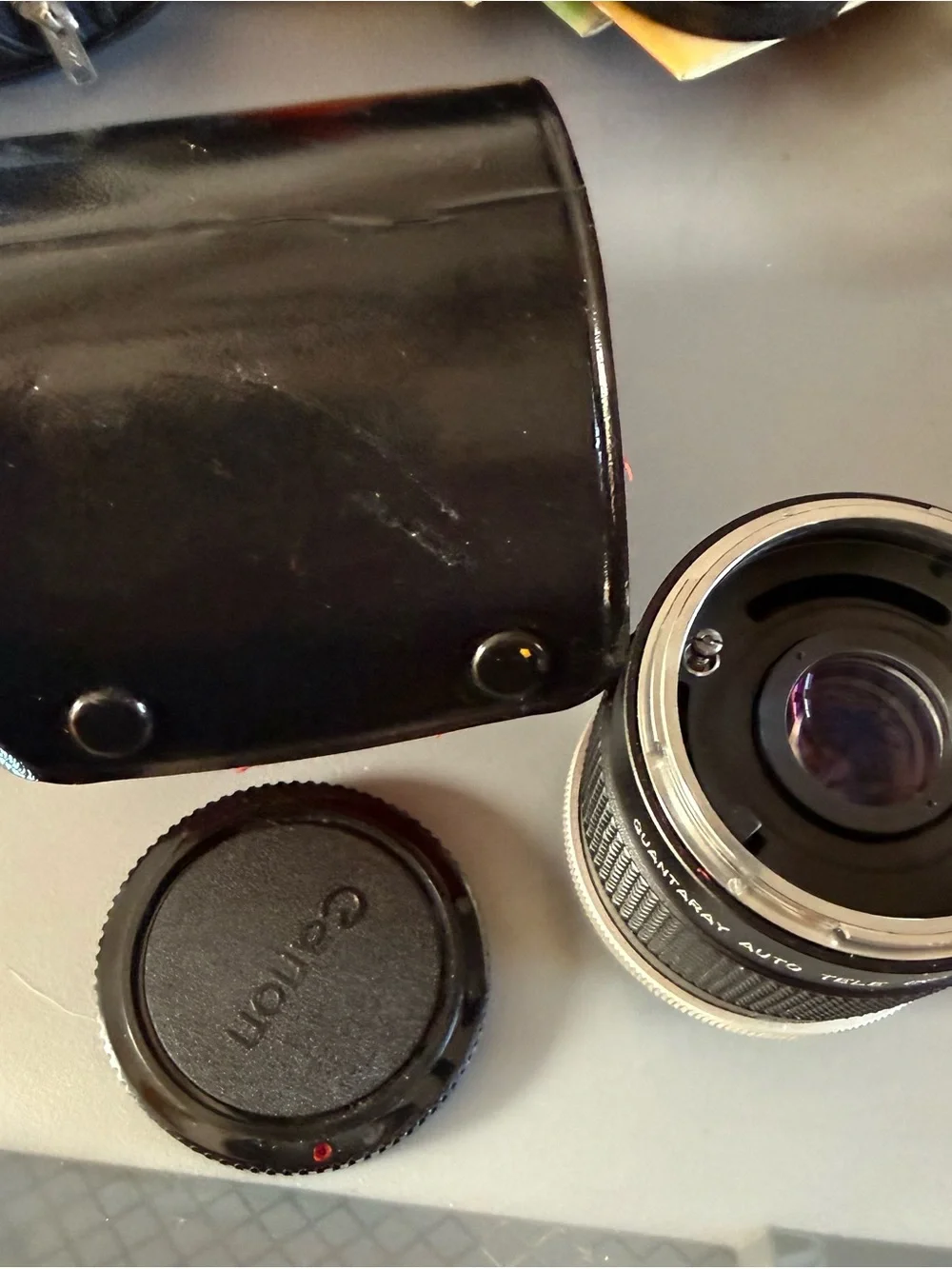 Vintage Canon Camera with lenses, filters, flash, tripod and other accessories.